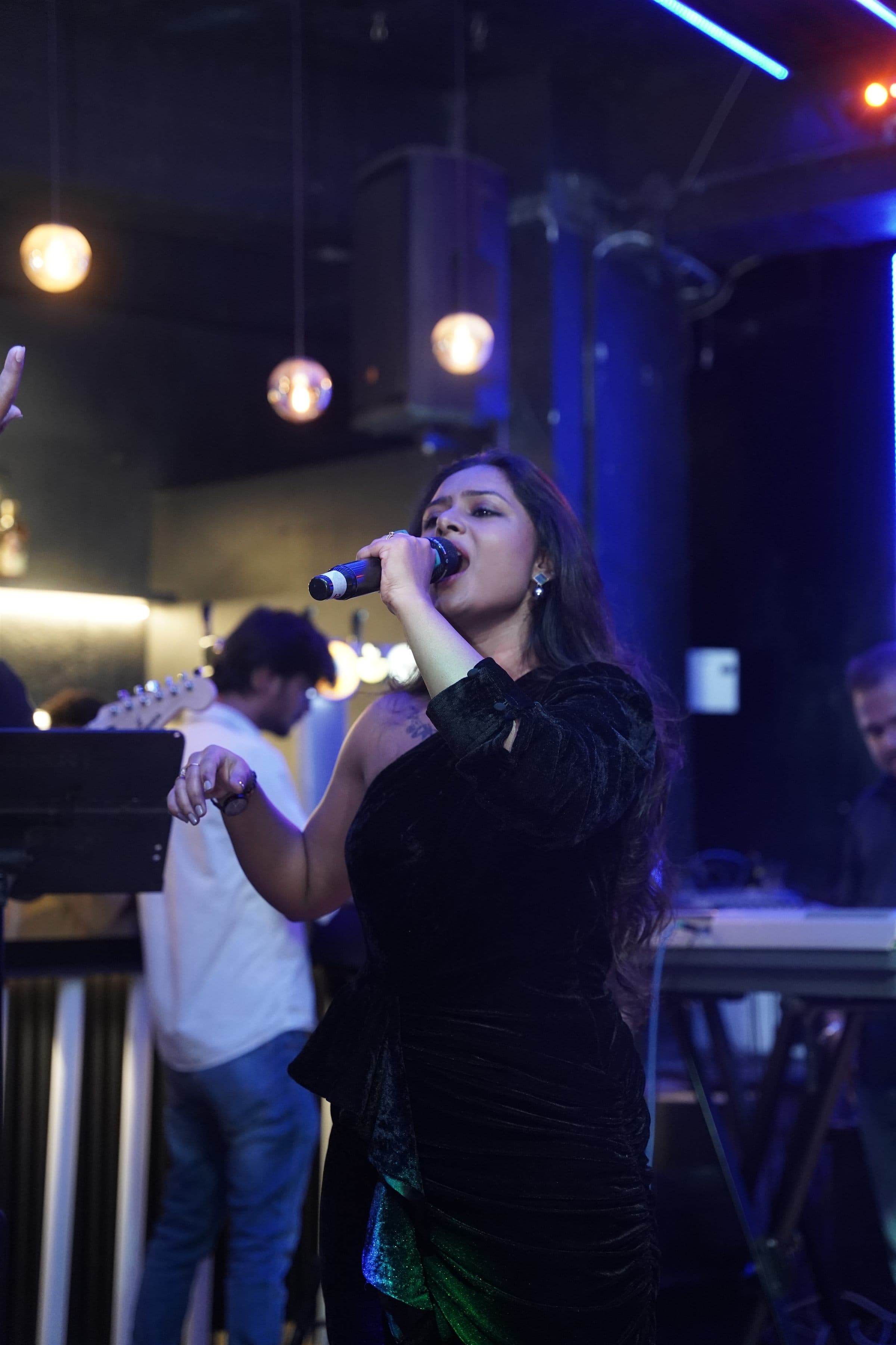 Malhar vocalist performing live