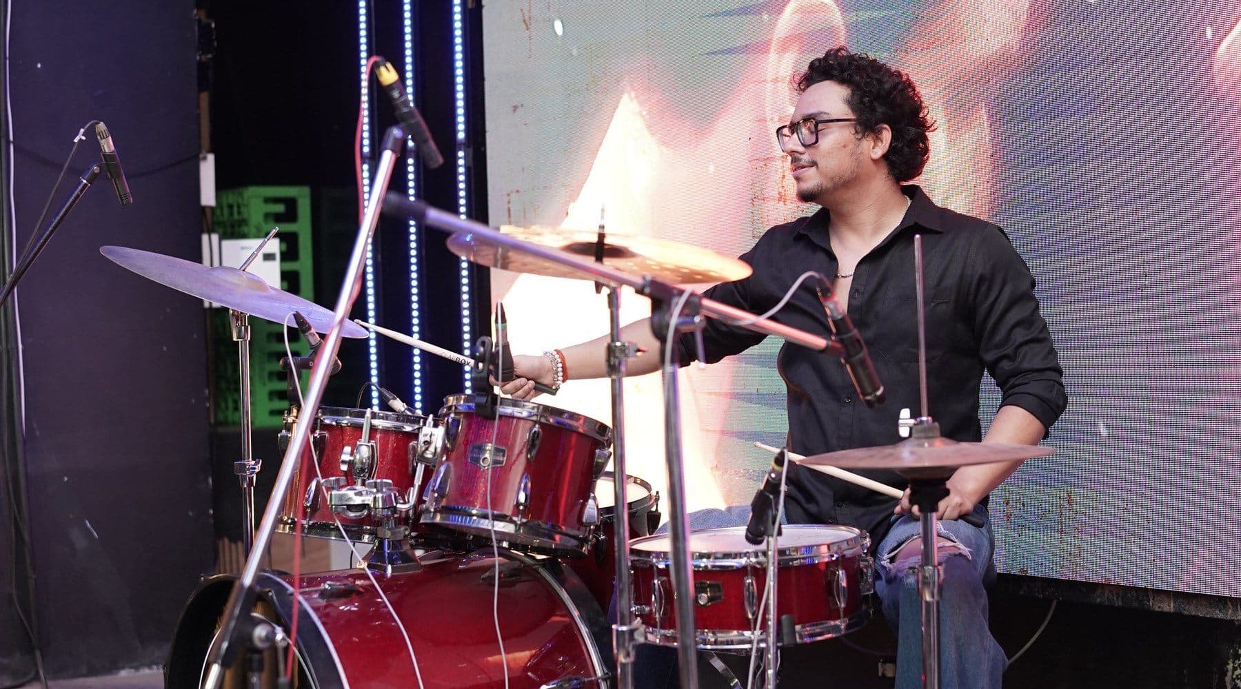 Malhar drummer performing live